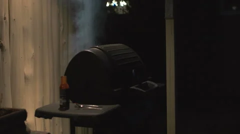Cooking on the Barbecue at Night Time. 動画素材 63345111