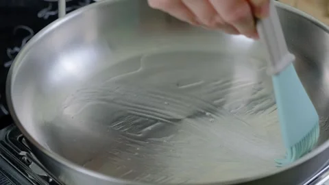 Cooking Batter with Silicone Spatula in Kitchen Pan Video stock 341461077