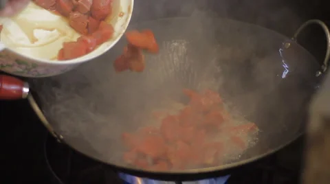Cooking Beef in a Hot Wok Stock Footage 1039450