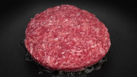 Cooking beef patty for burger. Making Tasty Hamburger Stock-Footage 161697062