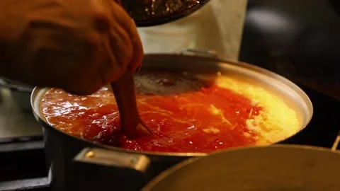 Cooking beet soup or borscht ukrainian traditional meal at domestic kitchen on a Stock Footage 149437805