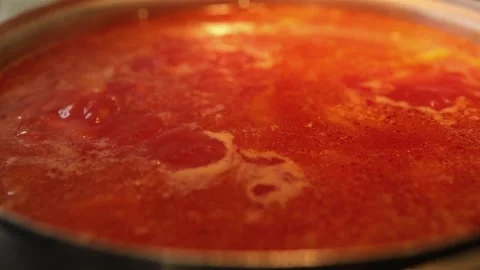 Cooking beet soup or borscht ukrainian traditional meal at domestic kitchen on a Stock Footage 149437840