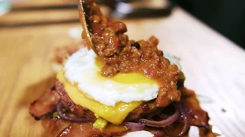 Cooking a big American bourger Stock Footage 101751424