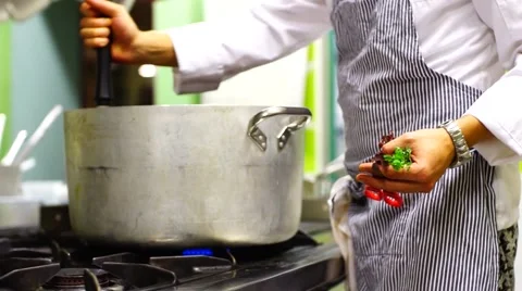 Cooking in a big pan 스톡 동영상 68729682