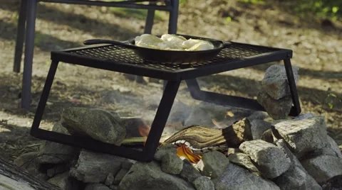 Cooking Biscuits Over An Open Fire While Camping Stock Footage 61215204