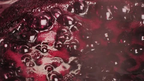 Cooking blueberry raspberry berrie jam with sugar, boiling marmalade, Jar of Stock Footage 296014456
