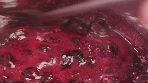 Cooking blueberry raspberry berrie jam with sugar, boiling marmalade, Jar of Stock Footage 296014550
