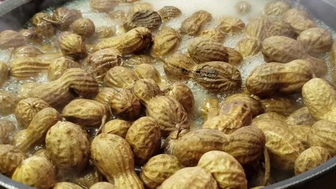 Cooking a boiled peanuts Stock Footage 104344601
