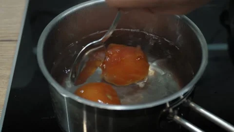 Cooking Boiled Tomatoes Video stock 312075970