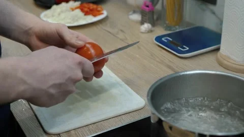 Cooking Boiled Tomatoes Video stock 315794658