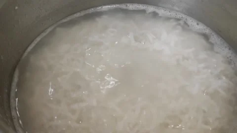 Cooking Boiling Rice 3 Stock Footage 301789365