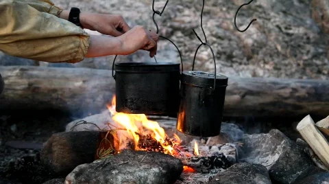 Cooking on bonfire Stock Footage 398792
