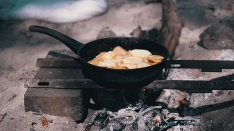 Cooking on Bonfire Stock Footage 293184720