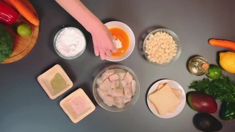 Cooking breaded white fish fillets Stock Footage 249457052