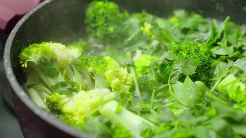 Cooking Broccoli Soup. bubbling broth of green vegetable soup being cooked Stock Footage 119259174