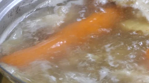 Cooking broth. Close up of boiling broth. Stock Footage 97897091