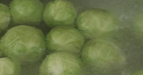 Cooking brussels sprouts closeup selective focus Stock Footage 156845126