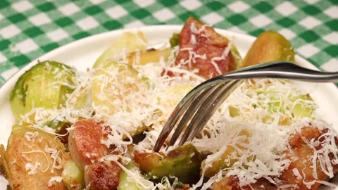 Cooking Brussels sprouts with crispy bacon. A Brussels sprouts and bacon dish. Video stock 286353126
