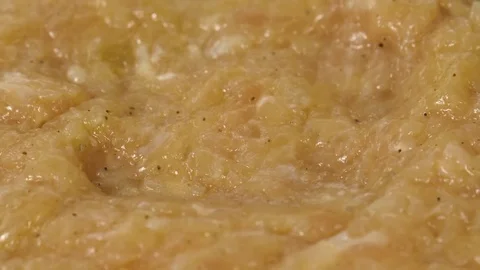 Cooking burger cutlet on the frying surface, camera zoom out, 4K 60 FPS Stock Footage 76897649