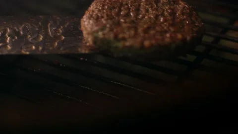 Cooking a burger on the grill Video stock 153153898