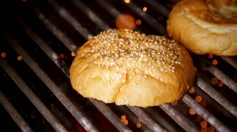 Cooking burger in slow motion Stock Footage 67855414