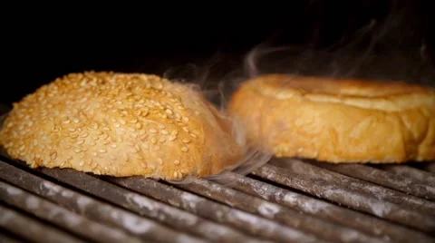 Cooking burger in slow motion Stock Footage 67858789
