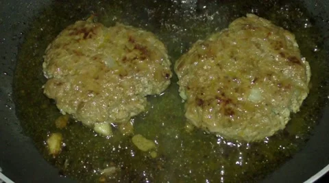 Cooking burgers Stock Footage 46987409