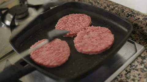 Cooking burgers Stock Footage 53077942