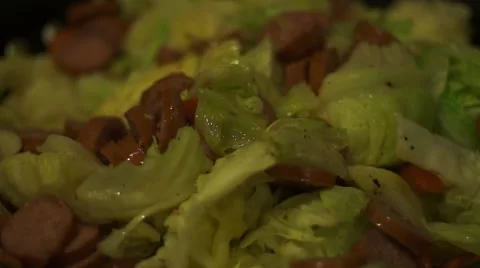 Cooking Cabbage and Sausage Stock Footage 48950547
