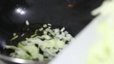 Cooking Cabbage, Broccoli and Carrots. Yakisoba Ingredients Stock Footage 129044535