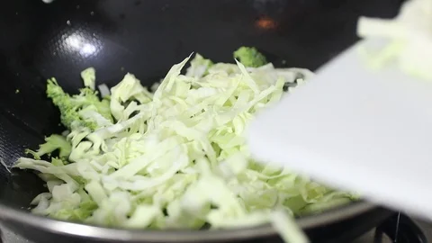 Cooking Cabbage, Broccoli and Carrots. Stock Footage 129249203