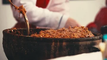 Cooking cabbage in a earthenware pot in a traditional way Stock Footage 86134495