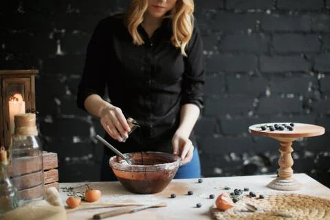 Cooking cake on the table and baking cake ingredients Stock Photos