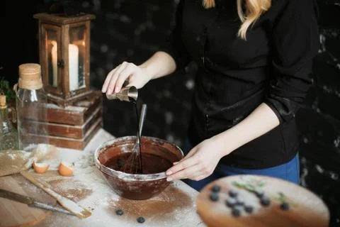 Cooking cake on the table and baking cake ingredients Stock Photos