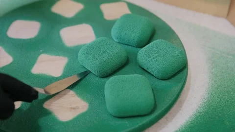 Cooking cake with velour coating. The mousse cake after spraying velour coating Stock Footage 134345453