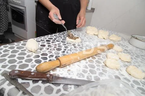 Cooking Cakes Of The Dough In The Kitchen