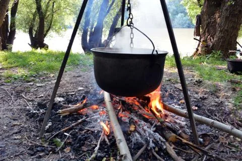 Cooking on campfire Stock Photos