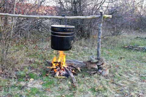 Cooking on a campfire Stock Photos
