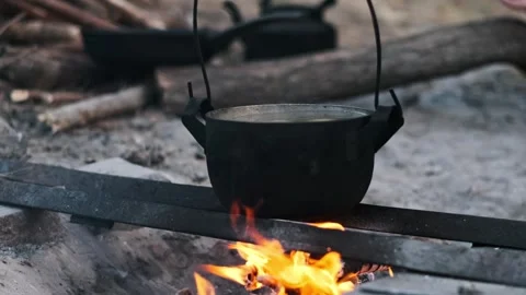 Cooking on Campfire, Water Boiling Stock Footage 303707626
