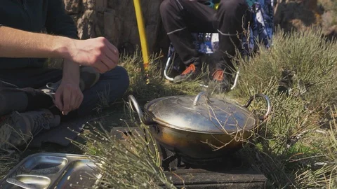 Cooking in camping conditions Stock Footage 130109924