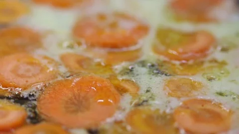 Cooking carrots Stock Footage 70759665