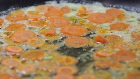 Cooking carrots Stock Footage 70759707