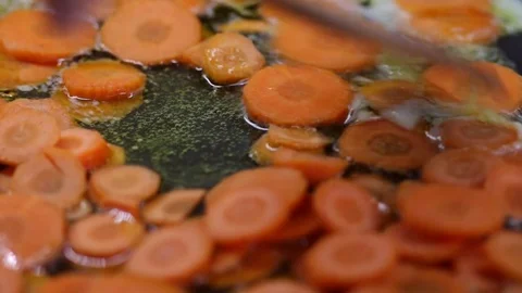 Cooking carrots Video stock 70759874