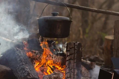 Cooking in a cauldron at the stake Stock Photos