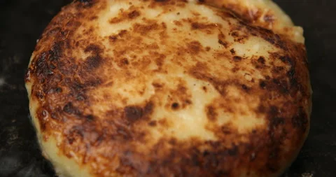 Cooking cheese pancakes in the kitchen Stock Footage 109434581