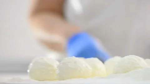 Cooking cheesecakes with cottage cheese Stock Footage 131858412