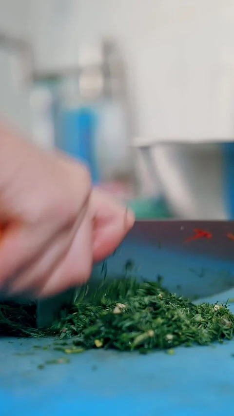 Cooking. chef cuts vegetables. buffet restaurant kitchen. close-up. the chef Video stock 318725933
