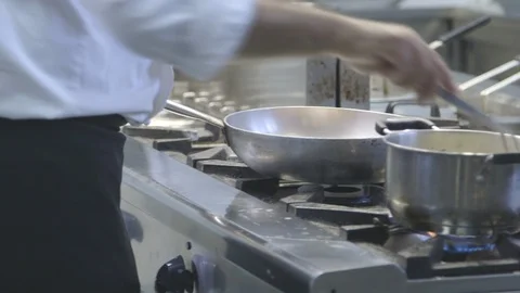 Cooking chef in a professional kitchen Stock Footage
