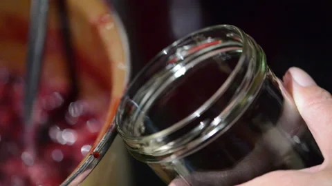 Cooking cherry fruit jam. filling into glass jar. 스톡 동영상 132437254