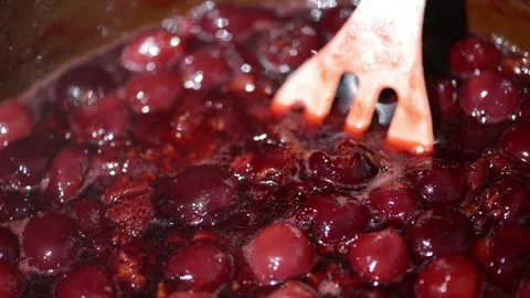 Cooking Cherry Jam on the Stovetop 스톡 동영상 247050087